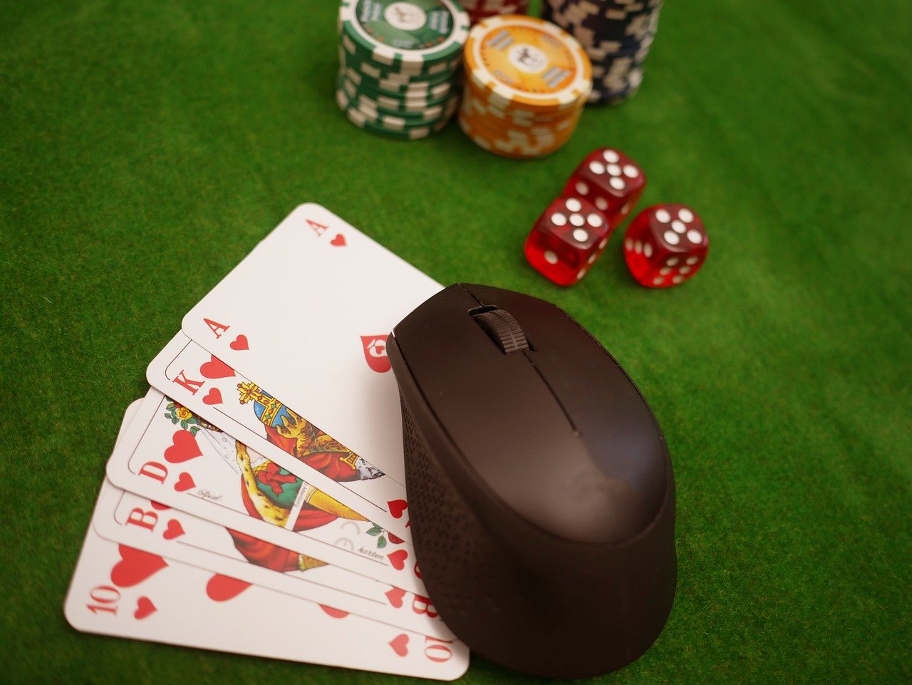 Cards, chips, dice, and a computer mouse